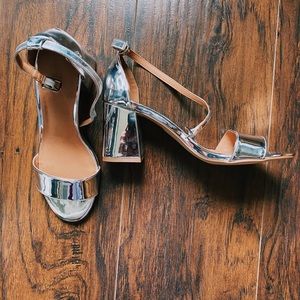 Chrome strap heels that give you a 60’s vibe